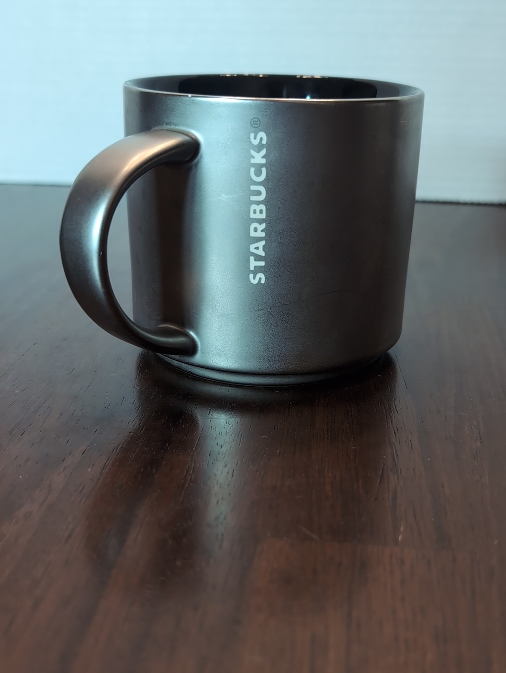 Starbucks 14 Oz Gray Gun Metal Embossed Coffee Mug.
